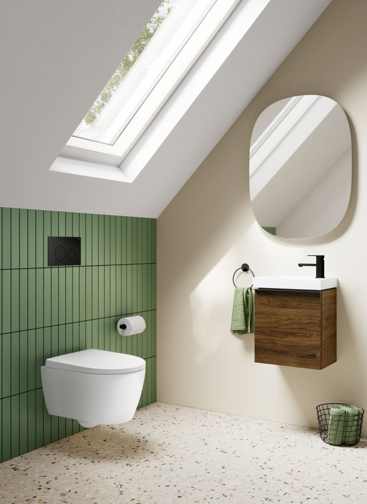 Small Geberit iCon guest bathroom with wooden furniture