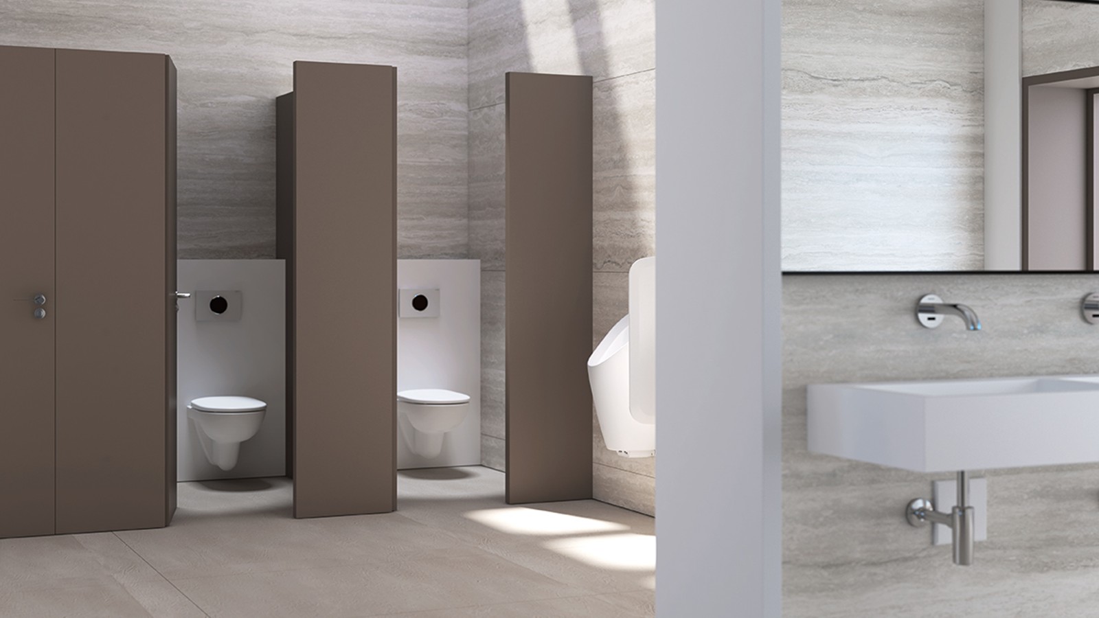 WC public équipé de réservoirs, de plaques de déclenchement WC et urinoirs Geberit