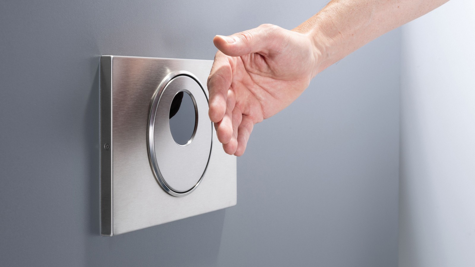 Plaque déclenchement sans contact Geberit Sigma10 avec déclenchement à distance de la chasse d'eau, ronde, avec main. Plaque déclenchement sans contact Geberit Sigma10 avec déclenchement à distance de la chasse d'eau, ronde, avec main.